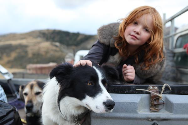 Chrissie Fernyhough is a contributing author in the book and this is her granddaughter and dog 
